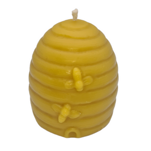Large yellow beehive-shaped beeswax candle decorated with bees